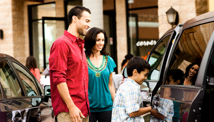 Family getting in car